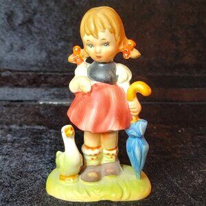 Arnart 5th Ave. Figurine Girl with Unbrella and Duck